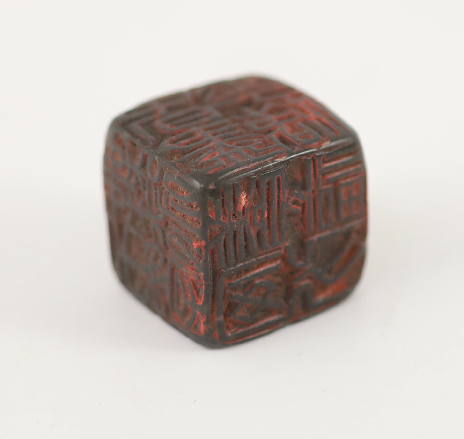 A Chinese dark green soapstone cube shaped seal, probably Qing dynasty, 3 cm